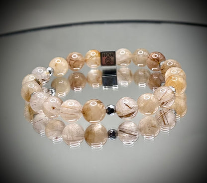 Гривна HOA „Рутилов кварц“ от естествени камъни, ръчно изработена. Висок клас рутилов кварц в светъл и изразителен стил.