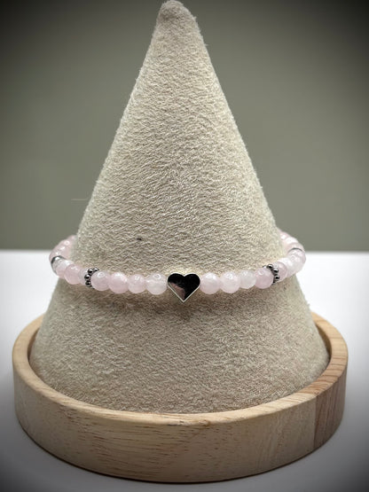 HOA Розов Кварц: Искра на Любовта - дамска гривна с фасетиран Розов кварц